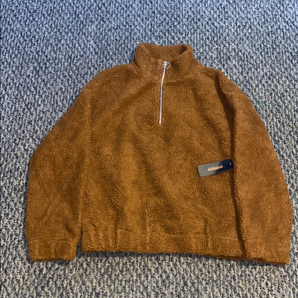 Cute Sherpa pullover jacket.